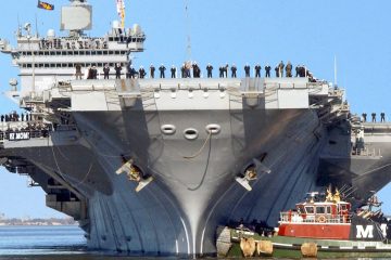 Massive US Aircraft-Carrier Escorted and Protected by Large Amount of US Navy Ships ( Video )